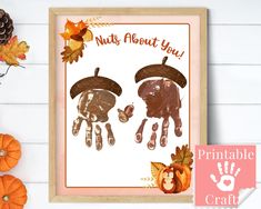 two handprints made to look like pumpkins and leaves with the words nuts about you