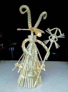 a sculpture made out of sticks and other items