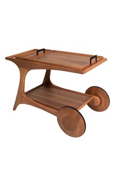 a coffee table with wheels on it and a wooden tray that is attached to the top