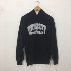 "*ITEM: Vintage 90s University Of Birmingham Small Vintage 1990s University OF Birmingham Hoodie Sweater Size S *ITEM DETAILS: 👇🏻 Please be aware that all vintage items will usually show a few signs of wear or fading due to age, but anything visible such as stains or holes, and serious flaws have been photographed.For any further information on this item please contact us and we will be happy to help. *SIZE: SMALL *ACTUAL SIZE MEASUREMENT: 👇🏻 *PIT TO PIT(WIDTH):22\"INCHES *LENGTH(FROM SHOULD Oversized Vintage Hoodie For Fall, Oversized Vintage Hoodie For College, Oversized 90s Winter Hoodie, Oversized 90s Hoodie For Winter, 90s Letter Print Hoodie For Streetwear, 90s Style Letter Print Hoodie For Streetwear, Oversized Vintage Hooded Hoodie, 90s Letter Print Hoodie For Fall, Varsity Hoodie With Graphic Print For Winter