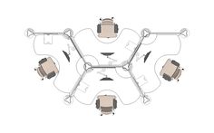 an overhead view of a conference table with four chairs and one chair in the middle