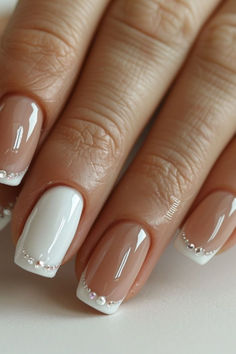 Are you in search of some attractive white nail designs to experiment with during this season? If yes, then you have landed on the right article! As summer is approaching, I have curated a list of my preferred styles to offer you some ideas. I have included various designs ranging from abstract to indie to cater to different preferences.Many of these styles can be easily replicated in the comfort of your own home! If you’re interested in trying a matte style White Color Nails Designs, French Tip Nail Styles, Pre Wedding Nails, Nails With White Dress, French Tip Nails Styles, White Nails With Designs Square, Short Square Nails Design Ideas 2024, Summer Nails 2024 Trends Square, White Nail Polish Designs