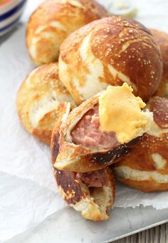 ham and cheese roll sandwiches are piled on top of each other, ready to be eaten