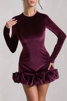 Opt for opulence at your next social event in our port mini dress. Claudine. Crafted in our signature stretch velvet. this long-sleeved bodycon is characterised by an extravagant display of ruffles along its hemline. Keep Claudine at the forefront during your next birthday soiree by pairing it with a sleek bun and gold accents. Features - Premium stretch velvet- Bodycon fit - Crew neckline - Padded shoulders- Long sleeves- Invisible zip closure - Ruffled hemline - Mini length Sizing & Fit Model is 5'7" and wears US size 4 / UK size 8 Product Information Designed exclusively by Club L London Fully lined with good stretch Premium velvet in Port (92% Polyester. 8% Elastane) 85cm total length SKU: CL128798101 Birthday Soiree, Dinner Dresses, Ruffled Mini Dress, Club L London, Sleek Bun, Black Dress Prom, Black Tie Gala, Social Event, Party Dress Long Sleeve