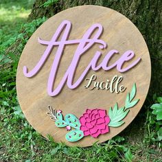 a wooden sign that says,'alice and the poohie'on it