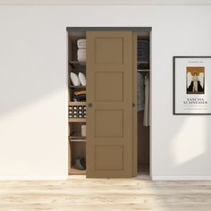 an open closet door in a white room