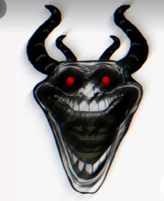 an evil looking mask with red eyes on a white background is seen in this image