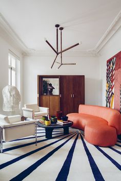 a living room filled with furniture and decor