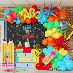 a back to school party with balloons and books