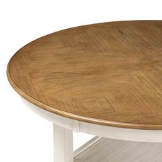 an oval wooden table with white legs and wood grain on the top, against a white background