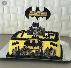 a batman themed birthday cake on a table