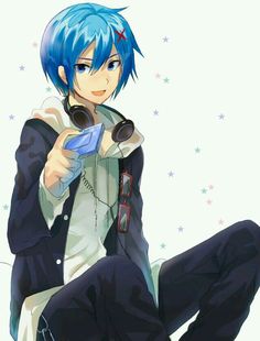 a man with blue hair sitting on the ground holding a pair of headphones in his hand