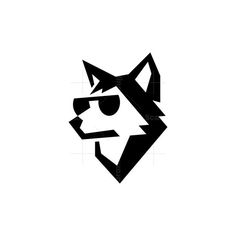 a black and white logo with a wolf's head