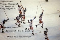 a group of young men playing a game of ice hockey on top of snow covered ground