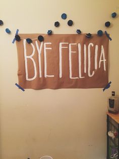 there is a sign that says bye felica on the wall