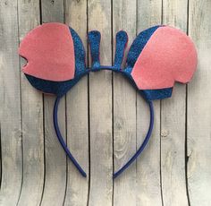 a pink and blue mouse ears headband