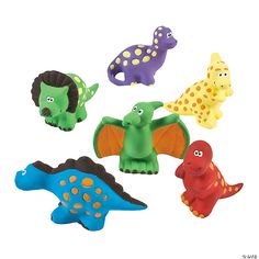 small plastic toy dinosaurs in various colors and sizes