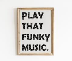 a sign that says play that funky music in black and white letters on a wall