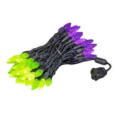 green and purple christmas lights with black wire