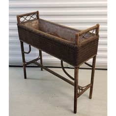 an old iron and wicker baby crib