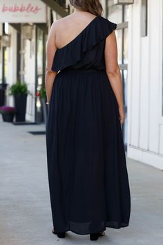 You'll look so fierce in this gorgeous dress! This dress has a beautiful black color with a flirty length and sleek material! This dress is perfect for any occasion, whether it is a plus on to a wedding or a fun holiday party! Style this dress with cute accessories and heels for a classy chic look! 100% Polyester Black Summer Maxi Dress For Prom, Black Maxi Dress For Summer Prom, Flirty Flowy Maxi Dress, Black Maxi Length Prom Dress, Chic Flowy Maxi Dress For Night Out, Black Maxi Dress With Flattering Silhouette, Black Flowy Maxi Dress For Party, Black Chiffon Midi Dress For Night Out, Summer Dresses With Flowy Skirt For Night Out