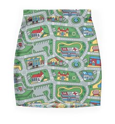 a green skirt with houses and roads on it