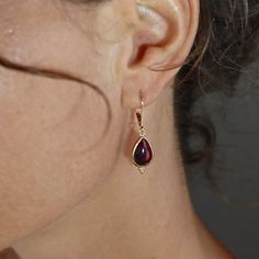 "Gold teardrop Women dangle earrings, Gold Garnet earrings, Simple everyday earrings, Birthstone earring. Also available with- Moonstone, Blue Opal, White Opal, Labradorite and in Sterling silver. Garnet-  Is the birthstone for the month of January  and the stone that celebrates the 2nd anniversary of marriage. it symbolizes peace, prosperity and good health. Some say it even has the power to give the wearer eternal happiness, health and wealth. 🌸 Product details: Handmade necklace 🌸 Measureme Gold And Red Jewelry, Garnet Earring, Red Stone Earrings, Health And Wealth, Vintage Gold Earrings, Vintage Earring, Dangle Earrings Gold, Garnet And Gold, Gem Earrings