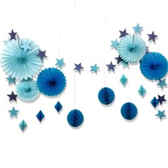 blue and silver stars hanging from the ceiling with paper fans on it's sides