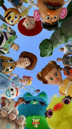 the poster for toy story 4 is shown in front of a blue sky with many cartoon characters