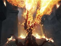 a man standing in front of a giant fire with his arms stretched out to the side