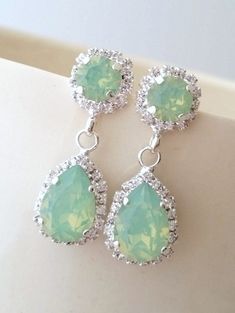 "Mint opal green seafoam Chandelier earrings, Drop earrings Bridal earrings, Silver earrings Estate style European earrings Bridesmaids gift Lovely and chic. These earrings are so sweet and romantic. They have great statement look and can't be missed yet they are not \"too much\". They would be great for bridal wedding or with evening dress but also just with casual outfit. Perfect gift for bridesmaids or any available other occasion. They are made of silver plate over brass posts and Swarovski Mint Green Bracelet, Bridal Earrings Silver, Mint Earrings, Bridal Earrings Chandelier, Earrings Opal, Bridal Earrings Drop, Swarovski Crystal Necklace, Bridal Bracelet, Wedding Jewelry Earrings