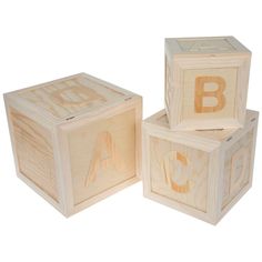 three wooden blocks with the letters abc and d on them, all in different sizes