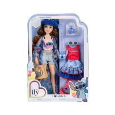 a doll in a box with clothes and accessories