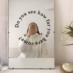 a woman taking a selfie in front of a mirror with the words do you see how far your cow goes?