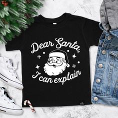 "\"DEAR SANTA, I CAN EXPLAIN\" Vintage Santa Claus Boy's Christmas T-Shirt - Boys Christmas shirts The perfect boys Christmas shirt for the holidays!  Shirt Colors: Black, Red, or Forest Green Sizes: 6M, 12M, 18M, 24M, 2T, 3T, 4T, 5/6T Fabric: Polyester Blend Sweatshirt has our signature Sonrise State tag sewn in!" Boys Christmas Shirt, Christmas Shirts For Kids, Santa Shirts, Vintage Santa Claus, Sewing Tags, Boys Graphic Tee, Boys Christmas, Perfect Boy, Custom Sweatshirts