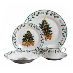 a christmas tree plate and cup set on a white background with green trimmings