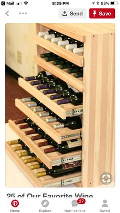 a wooden wine rack filled with lots of bottles