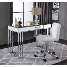 a white desk with chrome legs and a chair in front of a mirror on the wall