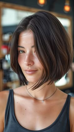 25 Slimming Haircuts to Elevate Round Face Symmetry Bob Hairstyles Long Front Short Back, Bob Hair Styles For Round Face, Bob Deep Side Part, Sleek Chin Length Bob, Short Hair Mid Size Woman, Chin Length Bob Square Face, Short Haircut With Face Framing, Short Bob Hairstyles For Round Faces, Short Hair Styles Asian