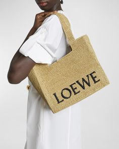 Loewe canvas cotton, linen, and leather tote bag with logo across front     Shoulder straps     Open top     Interior, one slip pocket     Approx. 11.9"H x 14.2"W x 6.6"D    Made in Spain Loewe Bag, Leather Artisan, 6 D, Open Top, Canvas Tote Bag, Leather Tote Bag, Canvas Bag, Canvas Tote, Leather Tote