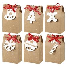 six brown paper bags with christmas decorations on them