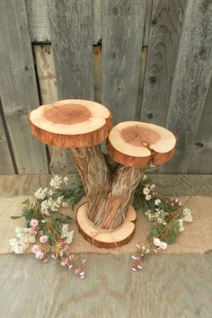 two tree stumps are stacked on top of each other