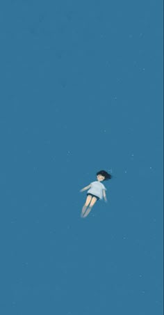 a woman flying through the air on top of a blue sky with stars in it