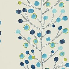 a blue and green tree with lots of circles on it's branches in front of a white background