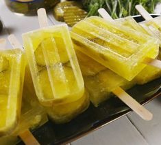 several popsicles are sitting on a metal tray