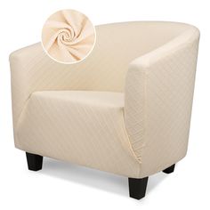 a white chair with a beige cover on it