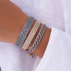 An instant classic, you can easily mix and match the Box bracelet. Looks great with a variety of bracelets. Made from the traditional weaving of gold threads called "Sfifa". This noble and emblematic material is used to adorn the most beautiful Moroccan caftans. To pay tribute to this craft, the founding sisters have revisited the "Sfifa" to make modern, sparkling and resistant jewelry. Ethically handmade in Morocco Silver and Gold Sfifa thread The fabric is waterproof. However, to maintain long Bracelet In Silver, Bracelet Box, Moroccan Caftan, Traditional Weaving, Gold Threads, Gold Gold, Purple Gold, Mix And Match, Morocco