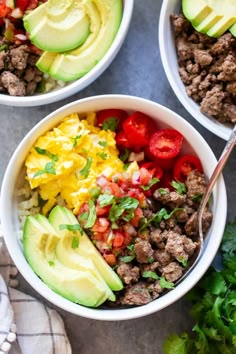 three bowls filled with meat, vegetables and avocado