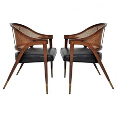 a pair of chairs with black leather upholstered on the back and armrests