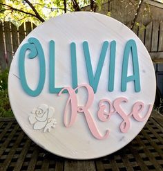 a sign that says ollivia rose on it